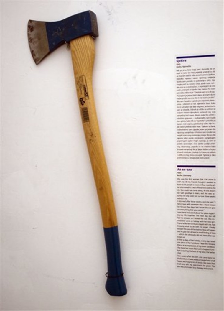 In this photo taken Friday, Feb. 10, 2012, an axe is displayed at the Museum of Broken Relationships in Zagreb, Croatia. The exhibits, collected from all over the world, are random and varied, ranging from fake breasts to a cast from a broken leg. Each item is accompanied by a summary of dates and locations of the relationships, and notes written by their anonymous donors. (AP Photo/Darko Bandic)
